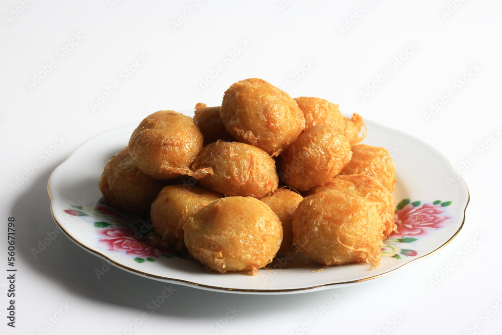 Indonesian food : Perkedel is fried patties, made of ground potatoes and minced meat and vegetables, isolated on white background. Indonesian food : Perkedel is fried patties, made of ground potatoes and minced meat and vegetables, isolated on white background.