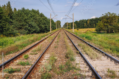 Obraz na płótnie Railway tracks in Dworzno village near Mszczonow city, Zyrardow County, Poland w salonie