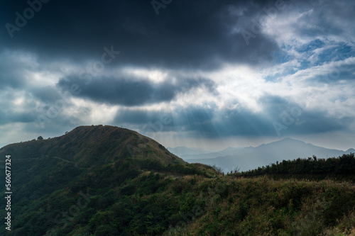 Watch the romantic Crepuscular Ray (cloud gap light) on the mountain. Buyan Pavilion, Shuangxi District, New Taipei City. Taiwan