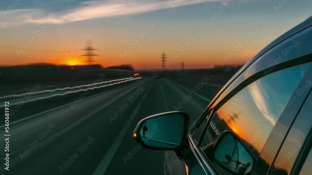 timelapse Driving at high speed through the streets timelapse drivelapse hyperlapse. View from side of car with slider movement at sunset on city road timelapse Driving at high speed through the streets timelapse drivelapse hyperlapse. View from side of car with slider movement at sunset on city road