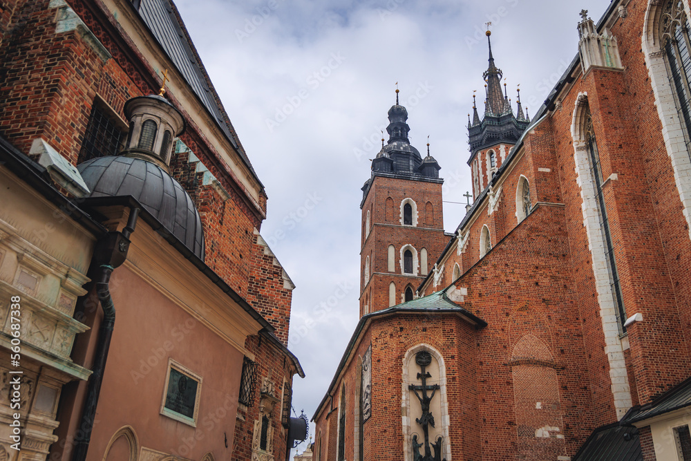 Basilica of Saint Mary on Main Square in Old Town of Krakow city,Poland, Saint Barbara Church on left side
