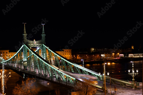 Nightlife, cityscape with a Bridge and a Tram at Budapest