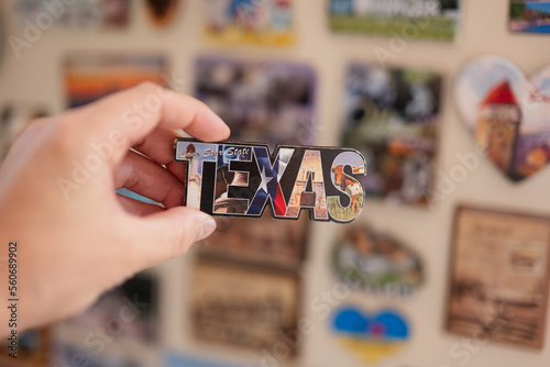 Texas USA souvenir refrigerator magnet at hand.