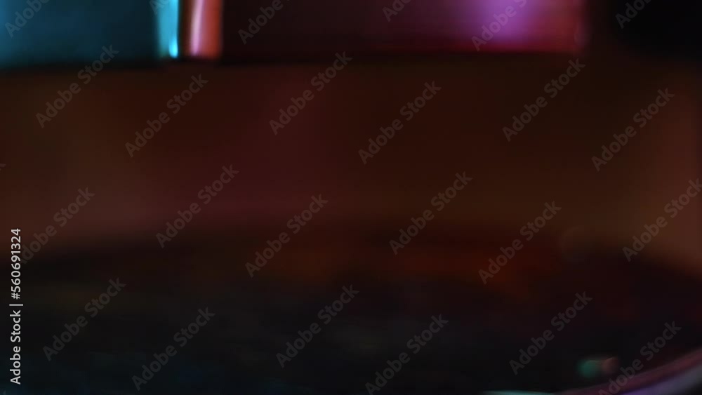 close up guitar in dark key and neon studio light close up guitar in dark key and neon studio light