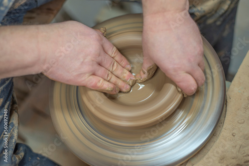 craftsman making pottery