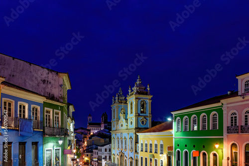 Fototapeta Night view of the houses and church of the famous historic district of Pelourinh