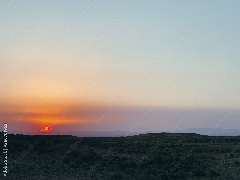 Dust in the Atmosphere at Sunset in the High Desert Dust in the Atmosphere at Sunset in the High Desert
