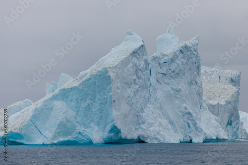 big icebergs floating over sea photo