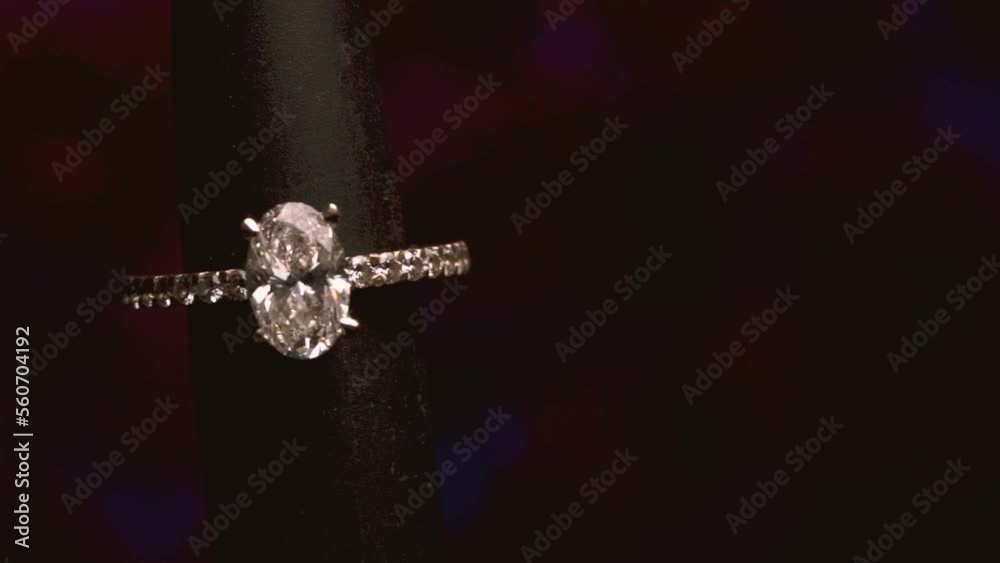 Beautiful Isolated Diamond Ring against Black Background