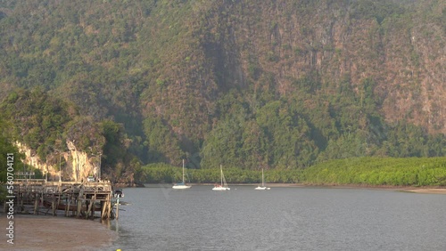 Yacht And Boats Floating In The Calm Waters Near The Ao Thalane photo