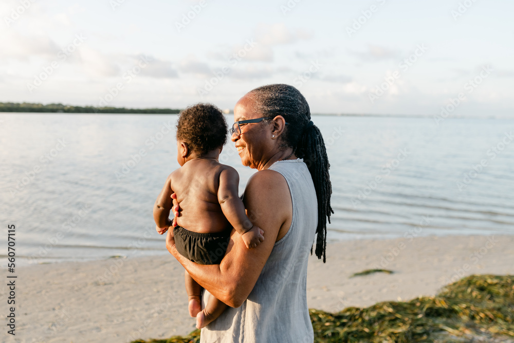 Grandma holds grandson