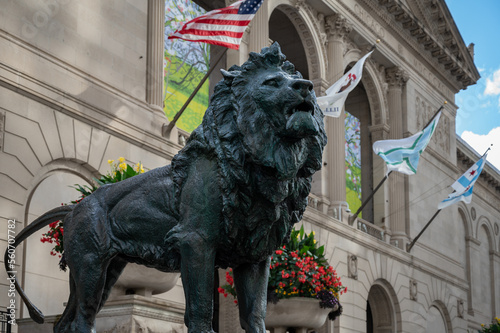 Detail of a metal sculpture of a lion in the streets of Chicago