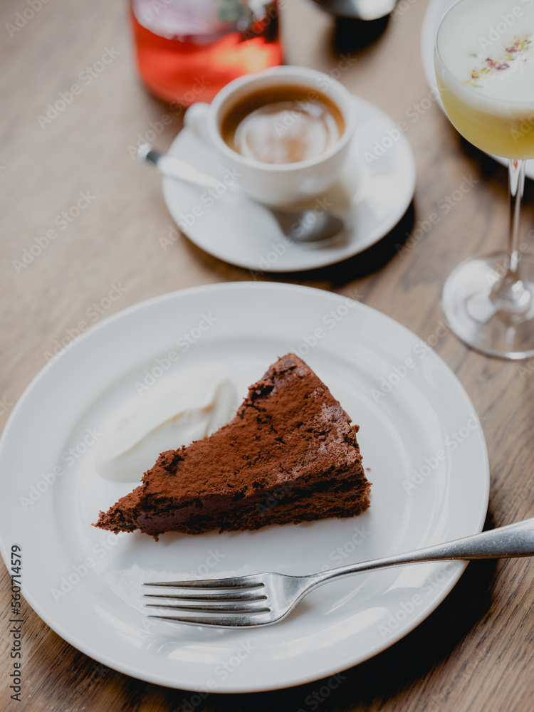 A chocolate tart with drinks A chocolate tart with drinks