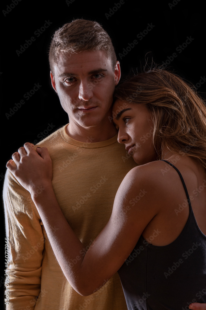 Young couple, in a moment of affection and protection Young couple, in a moment of affection and protection