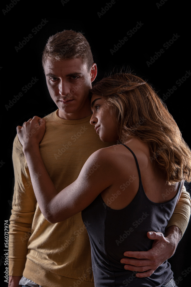 Young couple, in a moment of affection and protection Young couple, in a moment of affection and protection