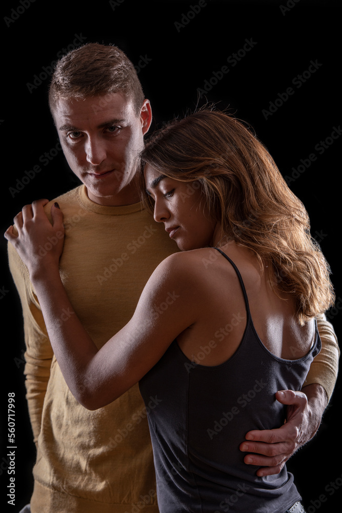 Young couple, in a moment of affection and protection Young couple, in a moment of affection and protection