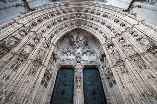 A detail view of a gothic-style portal, or doorway, on a Spanish cathedral. photo