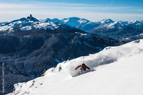 Woman snowboarding, Whistler, British Columbia, Canada photo
