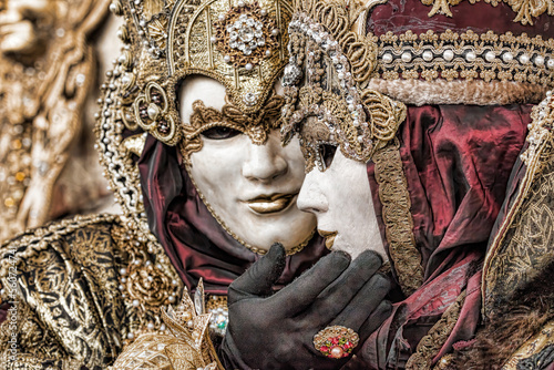 Fotografie Colorful carnival masks at a traditional festival in Venice, Italy