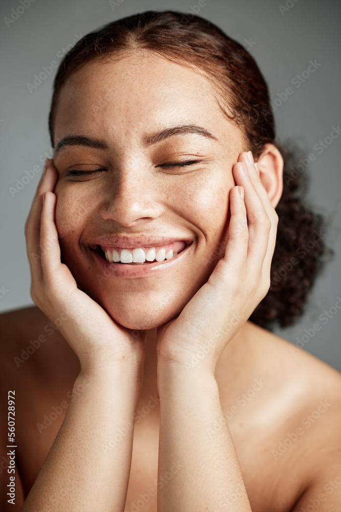 Face, skincare and makeup with a model black woman in studio on a gray background to promote natural care. Facial, wellness and makeup with an attractive young female happy with her cosmetic product Face, skincare and makeup with a model black woman in studio on a gray background to promote natural care. Facial, wellness and makeup with an attractive young female happy with her cosmetic product