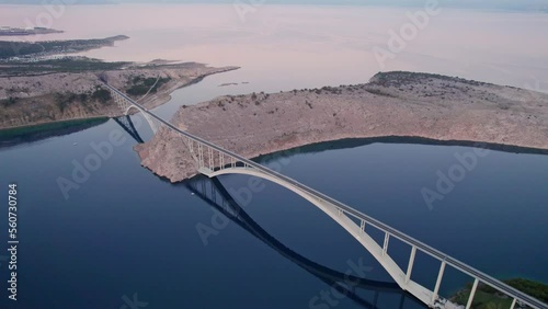 Krk Bridge between island and mainland Croatia at sunrise, aerial photo