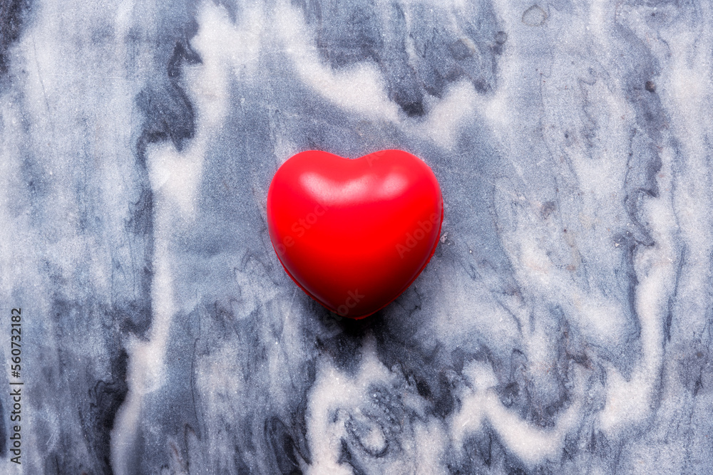 red heart on a marble top 