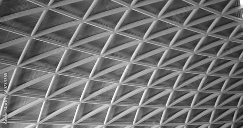 Detail from the roof of King's Cross station. Public place. Structure inside a building photo