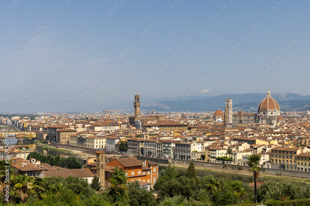 Panoramic view of Florence from the Michelangelo square. Beautiful city of Italy with old buildings and river.