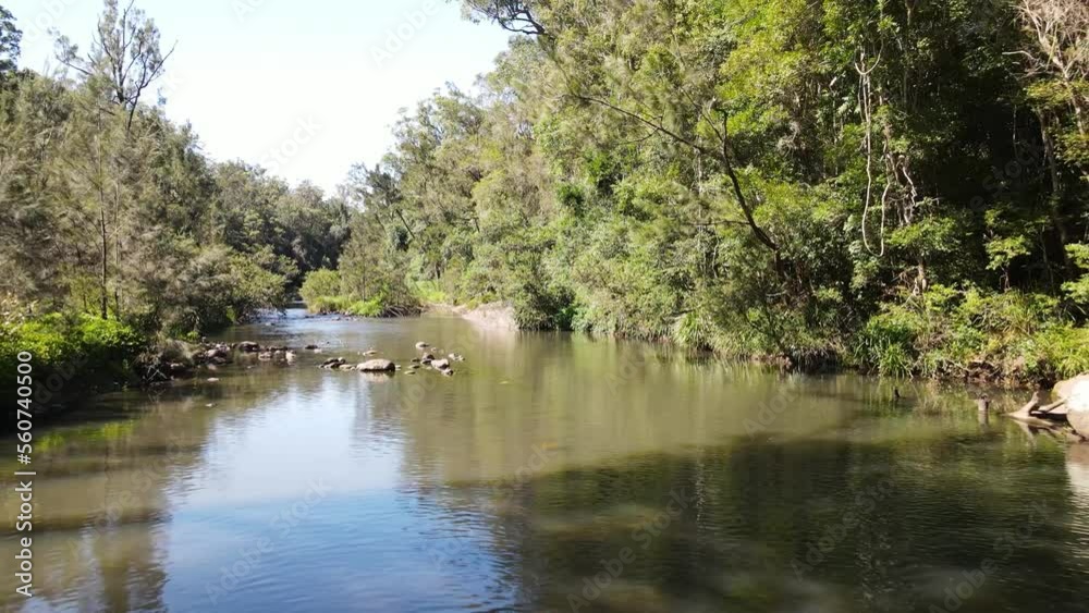 Unique drone view of water flowing through an Australian outback creek and billabong. Unique drone view of water flowing through an Australian outback creek and billabong.