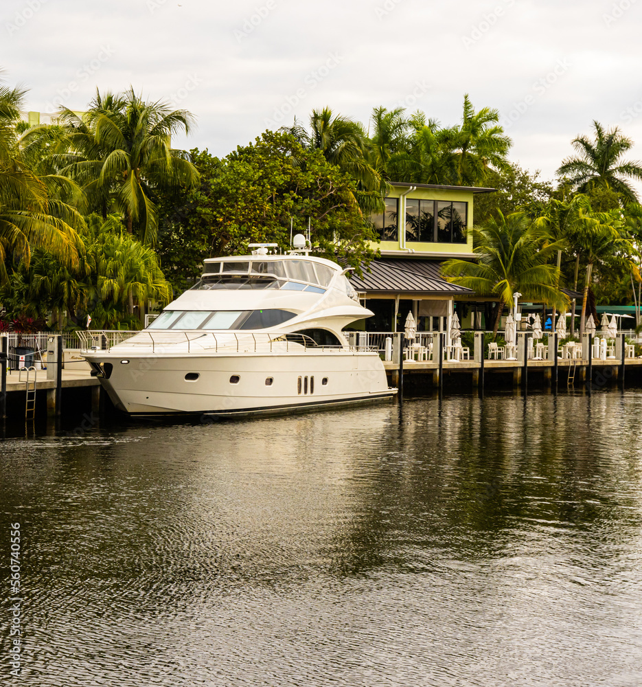 Fototapeta premium Pleasure boat Along The Riverwalk on The New River, Fort Lauderdale, Florida , USA