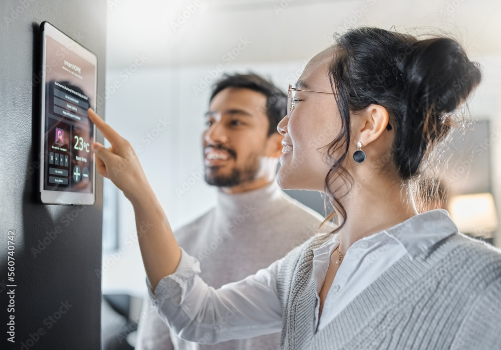 © Felix/peopleimages.com - Smart home technology, wall system and couple with digital dashboard for air conditioning, safety security network or house automation. App software, ui panel and Asian people programming IOT monitor