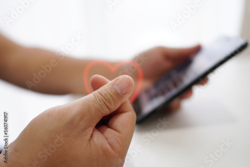 Cuadro en lienzo Young man making a small finger on the heart Expressed as communicating with finger symbols