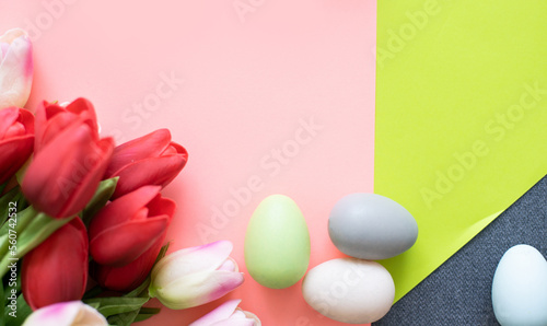 easter background with eggs and tulips