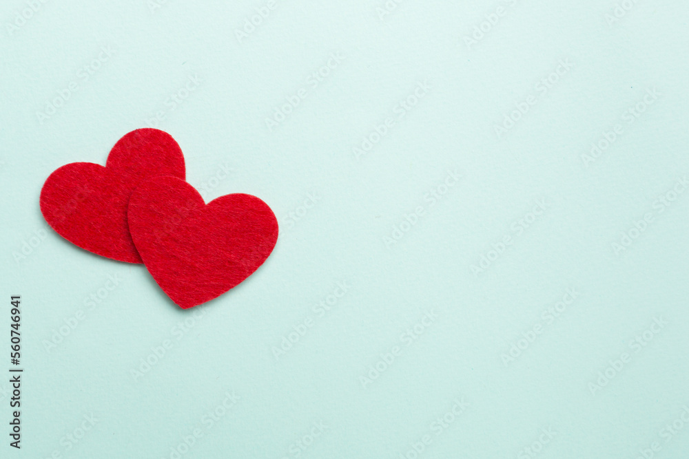 Felt hearts on color background, top view Felt hearts on color background, top view