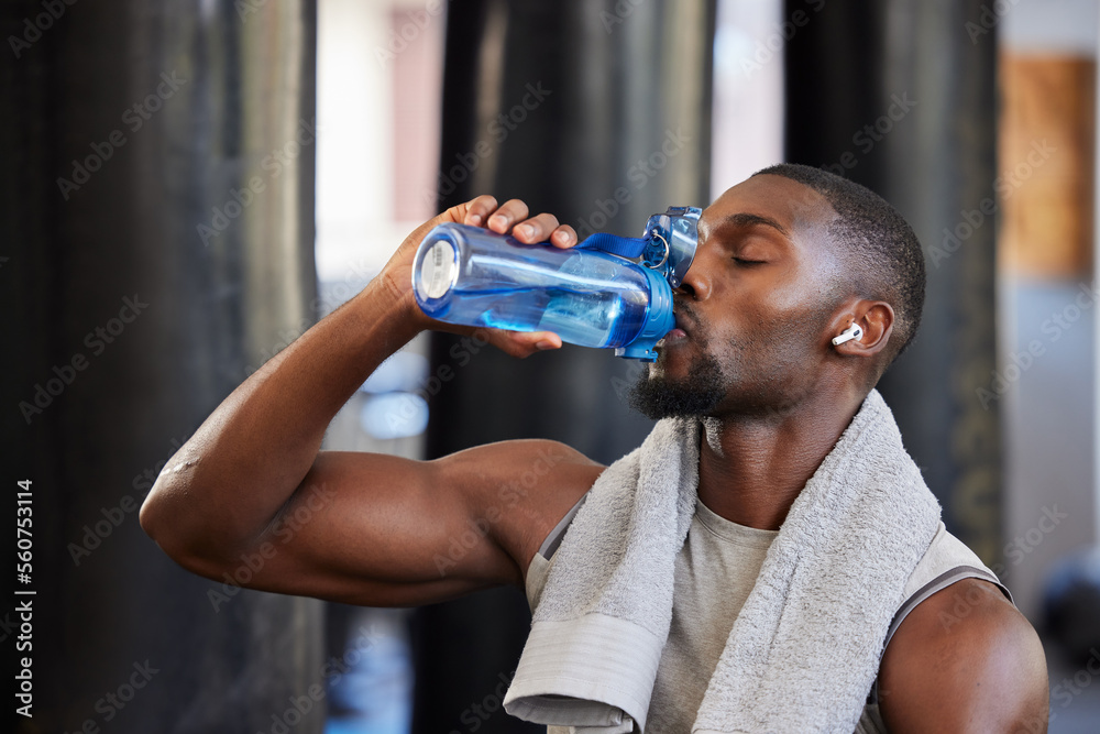 Fit Strong And Workout Break And Water Bottle With A Man Ready To Drink  Water On A Grey Studio Background Bodybuilder Drinking Water And Exercise  Or Training Break For Thirsty Hydration Stock