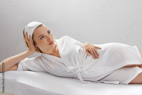 Female patient is waiting for the procedure in the spa salon