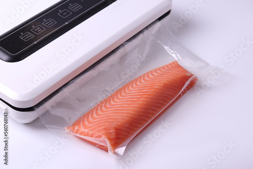 Salmon fillets in a vacuum package. Sous-vide, new technology cuisine. Selective focus, copy space