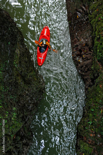 A man Paddles on the Alseseca River  in the Veracruz region of Mexico while scouting for huge whitewater.