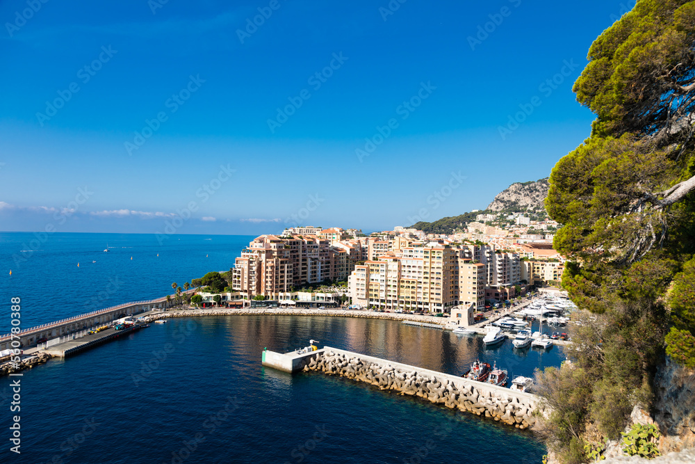 Montecarlo, Monaco - panoramic view of the Fontvielle port with blue sky and sea