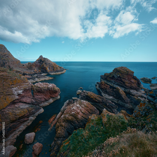 Scottish seashore with cliffs. St Abb's Head National Nature Reserve on the Berwickshire coastline, Scotland, UK