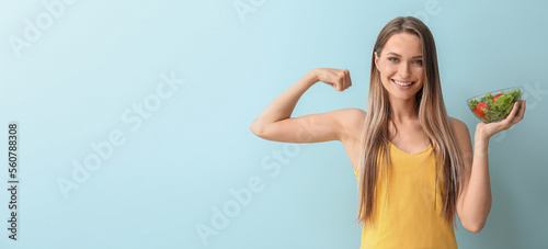 Leinwand Poster Healthy young woman with vegetable salad on light background with space for text