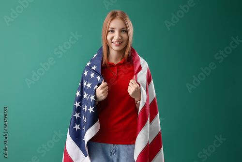 Young redhead woman with US...