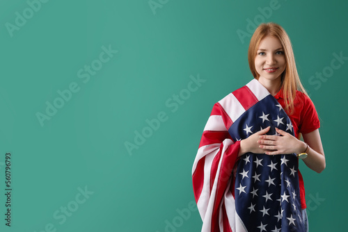 Young redhead woman with US...