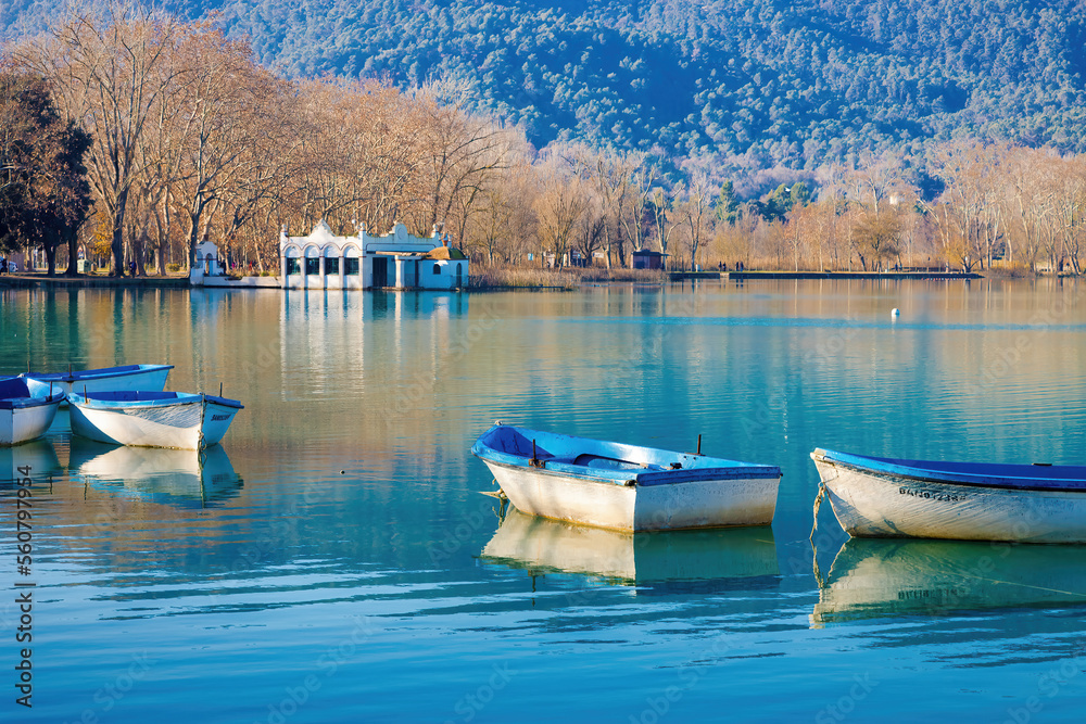 View of the boats anchored in Lake Banyoles with the fishing boats in the background.