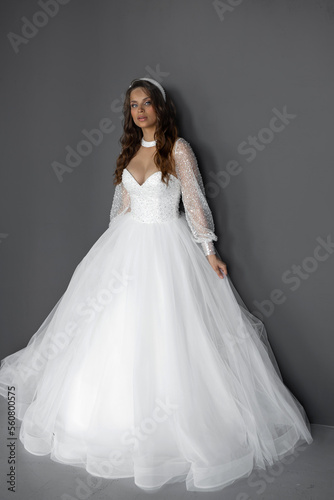 stylish caucasian bride in white wedding dress 