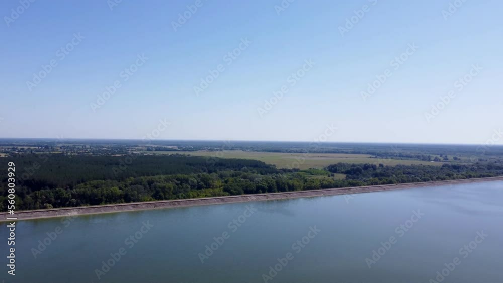 All-round panorama over the river from a drone height, from a bird's eye view. Drone footage of the river and islands on the river. Flight over the river, an island in the river. All-round panorama over the river from a drone height, from a bird's eye view. Drone footage of the river and islands on the river. Flight over the river, an island in the river.