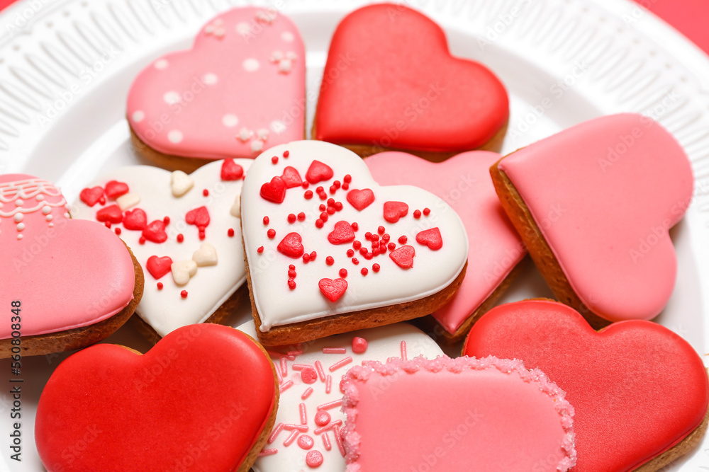 Obraz premium Plate of tasty heart shaped cookies, closeup. Valentine's Day celebration