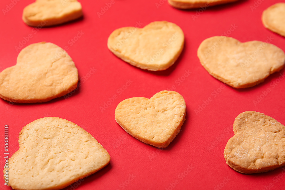 Sweet heart shaped cookies on red background, closeup. Valentines Day celebration Sweet heart shaped cookies on red background, closeup. Valentines Day celebration