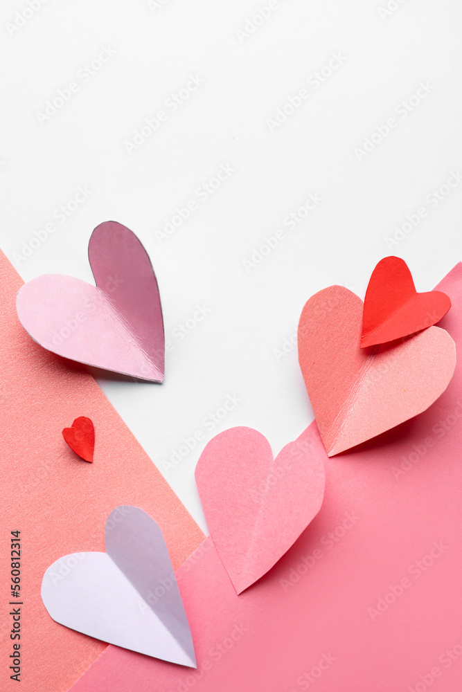 Beautiful composition with paper hearts on color background. Valentines Day celebration