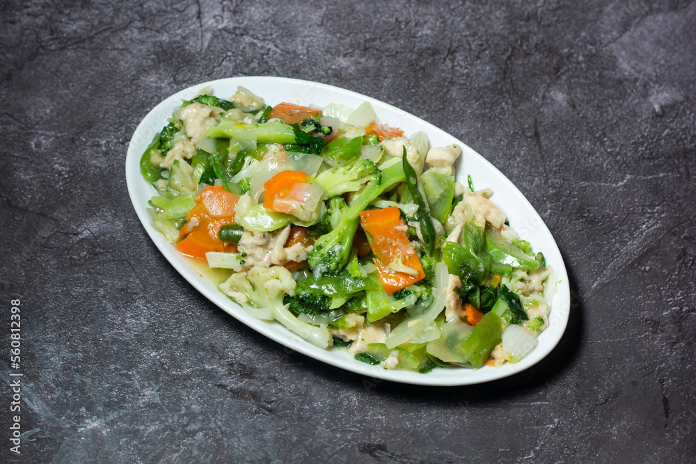 Chicken Vegetable served in dish isolated on grey background top view of indian and bangladesh food Chicken Vegetable served in dish isolated on grey background top view of indian and bangladesh food